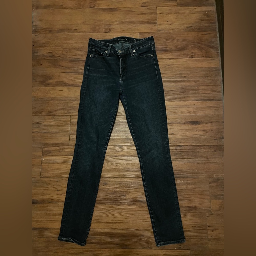 Skinny dark blue jeans